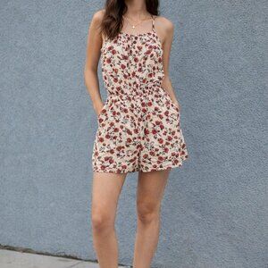 Divided size 4 lightweight Floral Print Romper, with pockets, deep V back